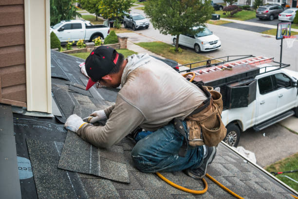 Professional Emergency Roof Repair technician working in Sharon, MA